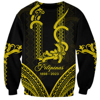 Black sweatshirt with gold barong-style patterns and front text 'Pilipinas 1898–2023'