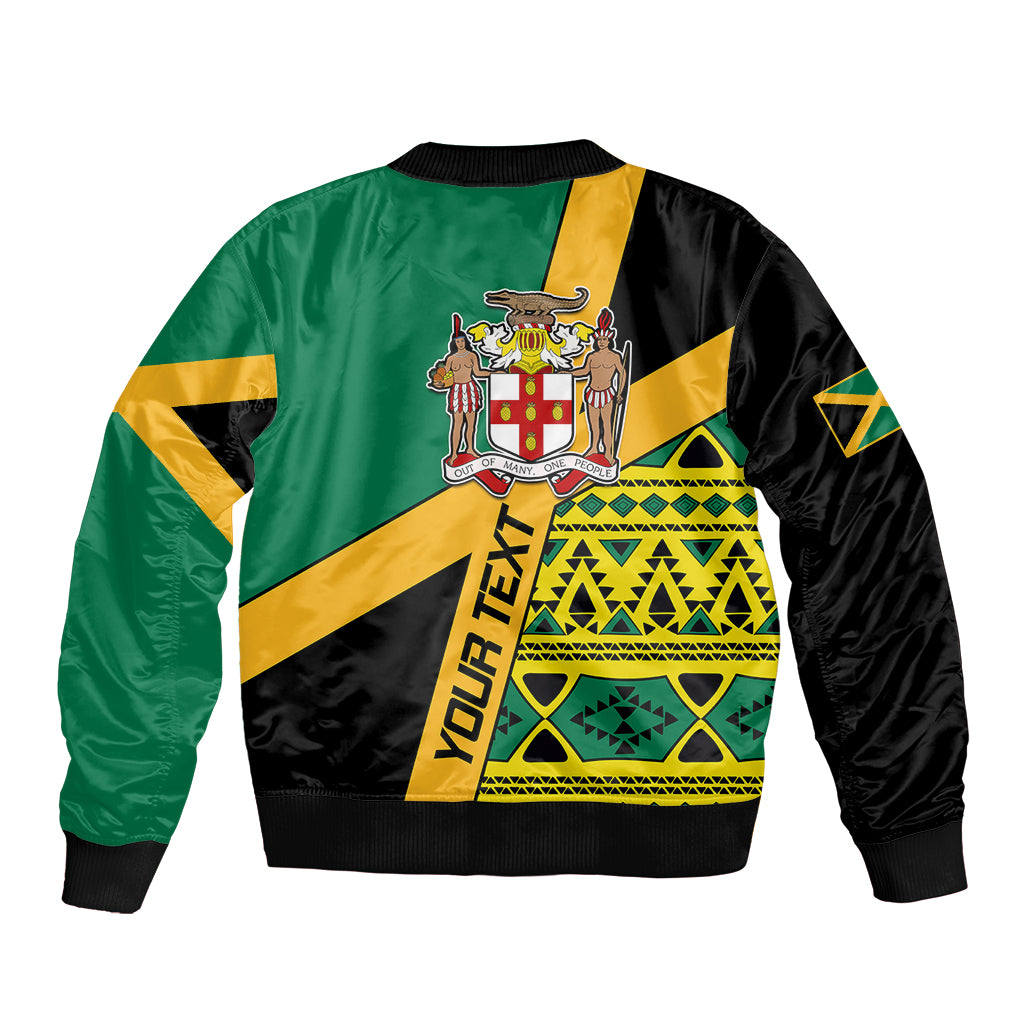 Green bomber jacket with black sleeves and yellow crest center, geometric flag graphic