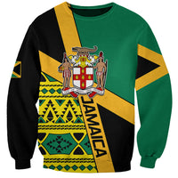 Unisex crewneck sweatshirt in green with Jamaican flag pattern and Jamaica crest graphic