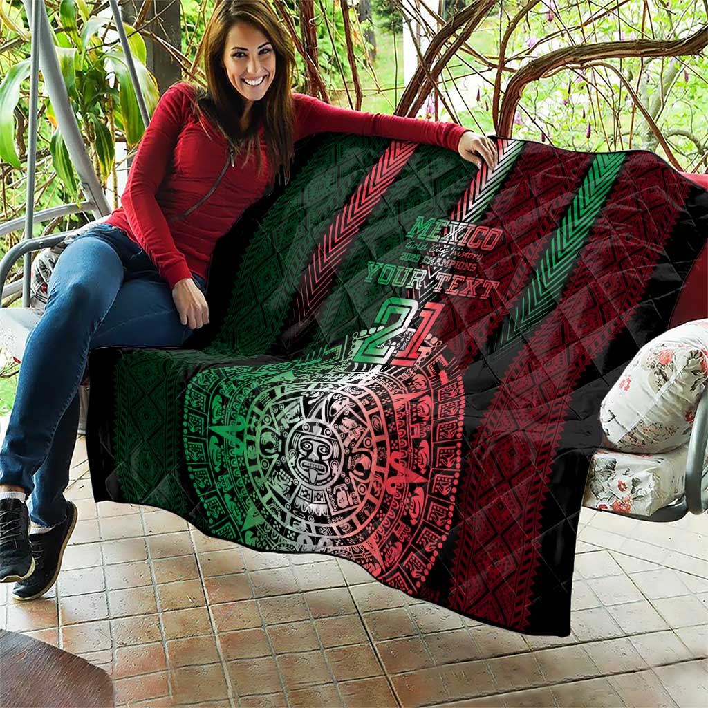Black quilt laid across a person’s lap, Mexico green/red Aztec emblem, number 21