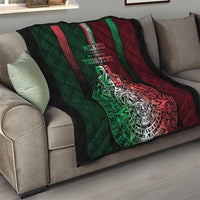 Black throw quilt on a couch with Mexico green/red Aztec emblem, number 21, custom text