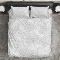 Kids white bedding set with two matching pillows and Polynesian style pattern on duvet