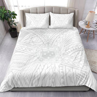 Kids white bedding set with two pillows and patterned duvet featuring a central emblem