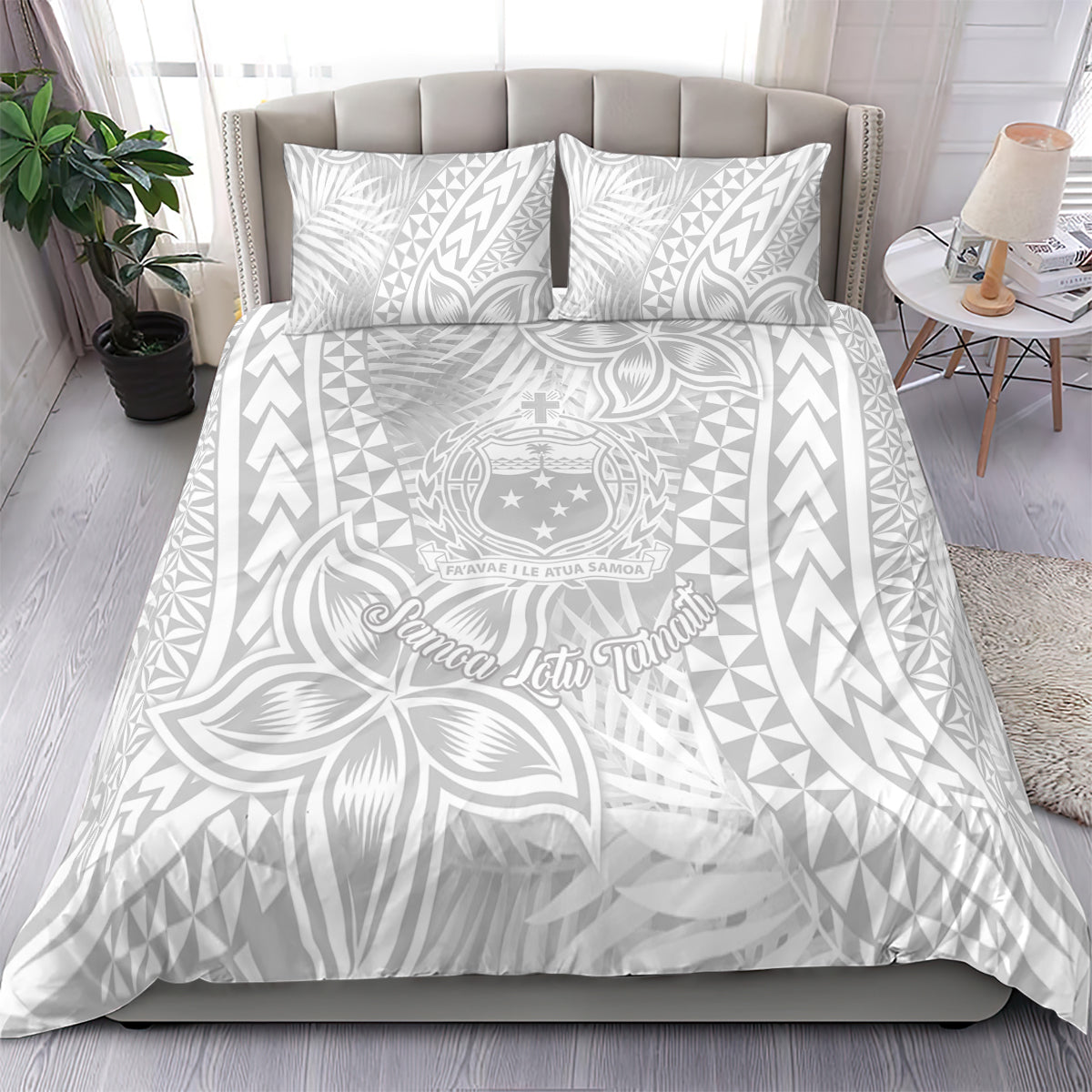White duvet cover with Polynesian crest and leaf motifs, geometric pattern; two pillowcases