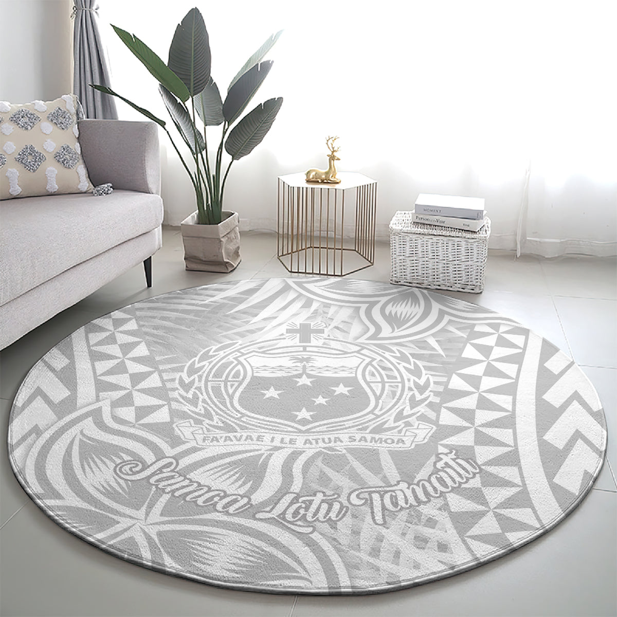 Round gray-and-white Polynesian rug with central crest and star accents