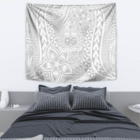 White wall tapestry featuring gray geometric chevrons, floral shapes, and a central emblem.