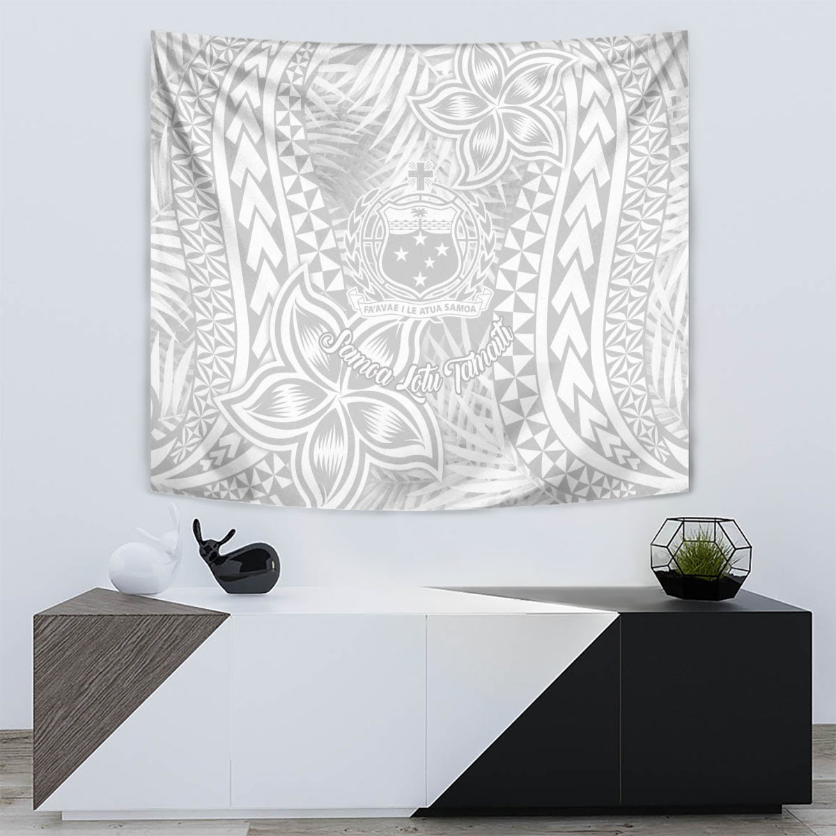 White decorative tapestry with gray Polynesian-style emblem, cross, and leaf motifs.