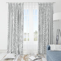 White sheer-style window curtain with tropical leaf and geometric print