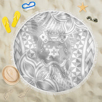 Round white beach blanket with gray tropical Polynesian pattern and fringe border