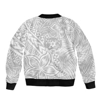 Unisex white bomber jacket, black ribbed collar and hem, back shows tropical Polynesian print