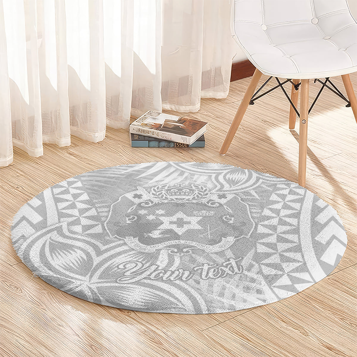 Round gray rug with white Polynesian center design and “Your text” lettering
