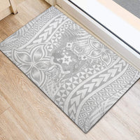 Rectangular rubber doormat with gray tropical Polynesian print and 'Your text' center