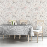 Tablecloth corner on dining table, white with gray Polynesian leaf and triangle pattern