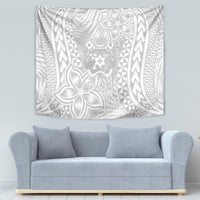 White tapestry with symmetrical tropical leaf and geometric pattern, central crest emblem