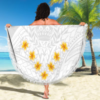 Round white beach blanket with gray tribal design, yellow plumeria flowers, and fringed edge