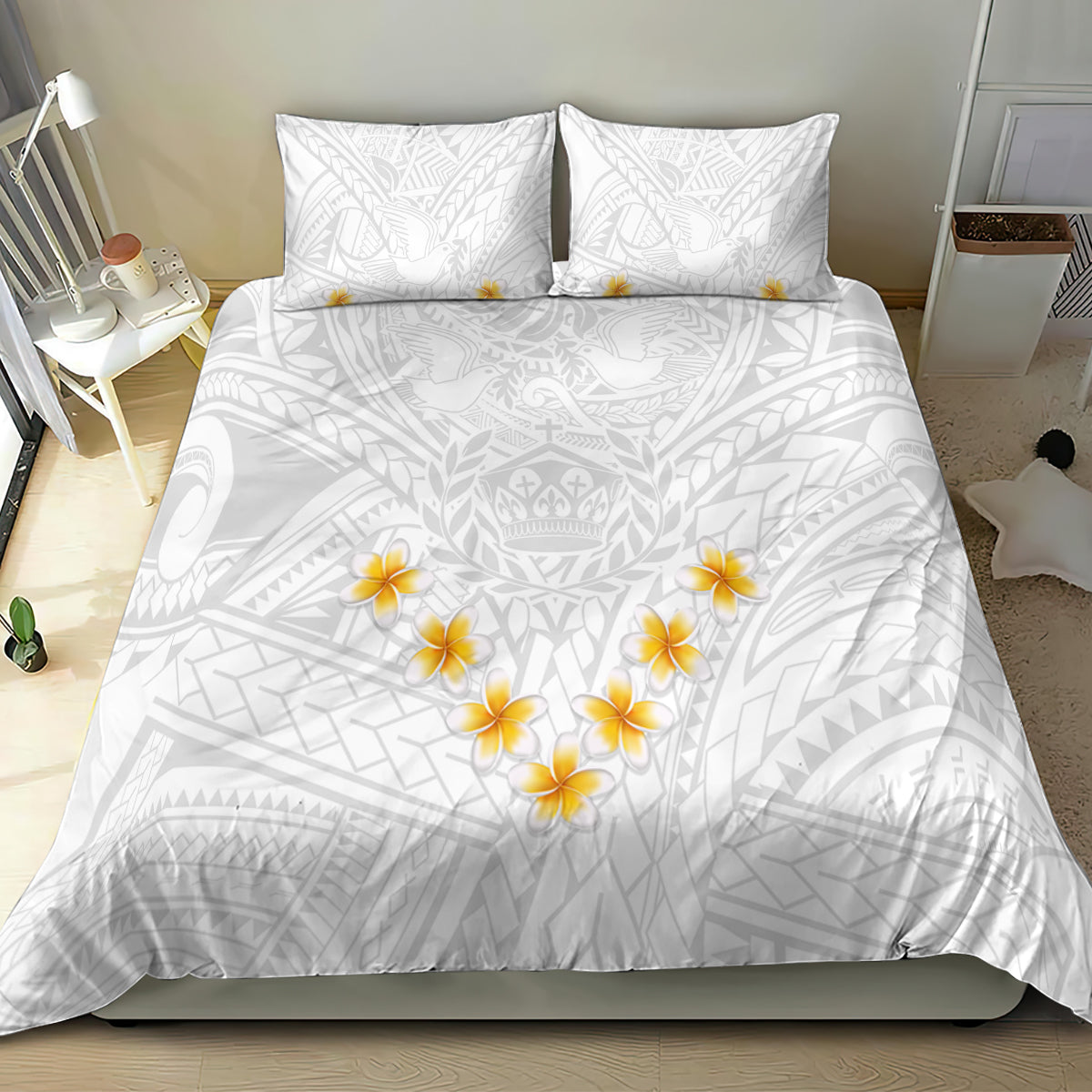White bedding set: duvet with tribal print and yellow plumeria flowers, with two decorative pillows