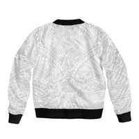 Unisex white bomber jacket back view with black ribbed hem and tribal pattern