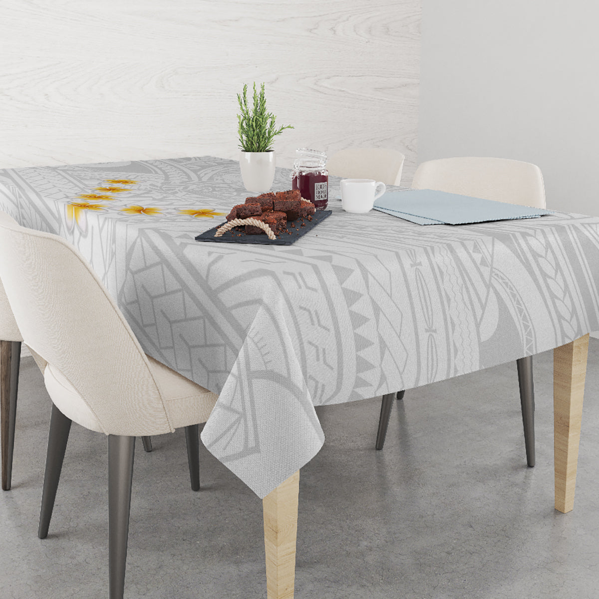 Gray geometric tablecloth with scalloped drape and corner drop at dining table