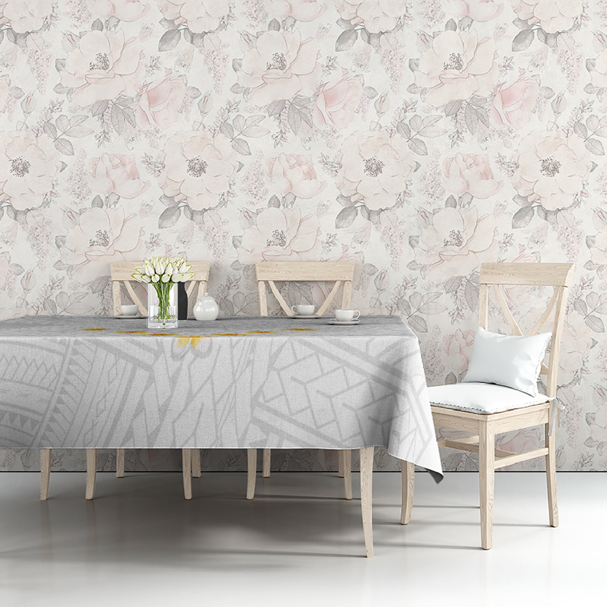 White and gray geometric tablecloth draped on rectangular table