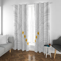 White window curtain with gray tribal print and scattered yellow plumeria flower details