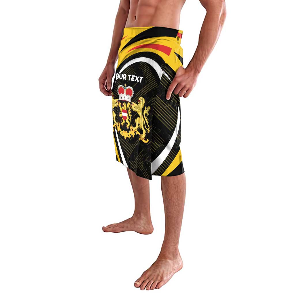 Black, gold and white patterned knee-length wrap sarong with crest emblem detail