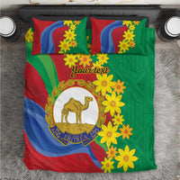 Green, red, and blue duvet set with yellow flower print and camel crest