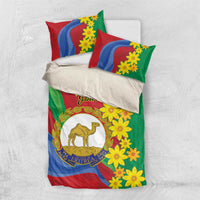 Green bedding set with red and blue stripes, yellow flowers, and camel emblem