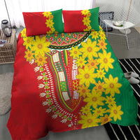 Red and green floral duvet cover with yellow flower accents and two matching square pillowcases.