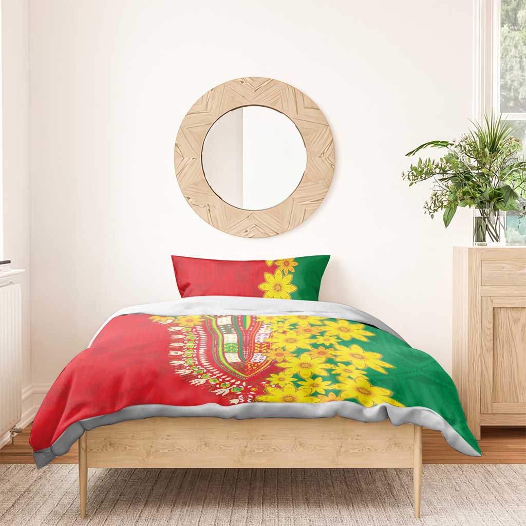 Red and green floral duvet cover with yellow flower motif and matching pillowcases on a bed.