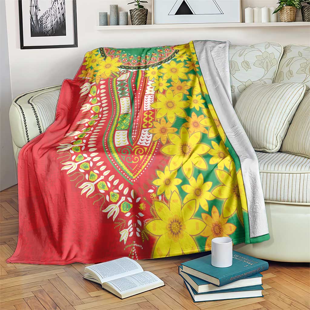 Multicolor floral blanket with red, yellow, green panels and decorative patterned border