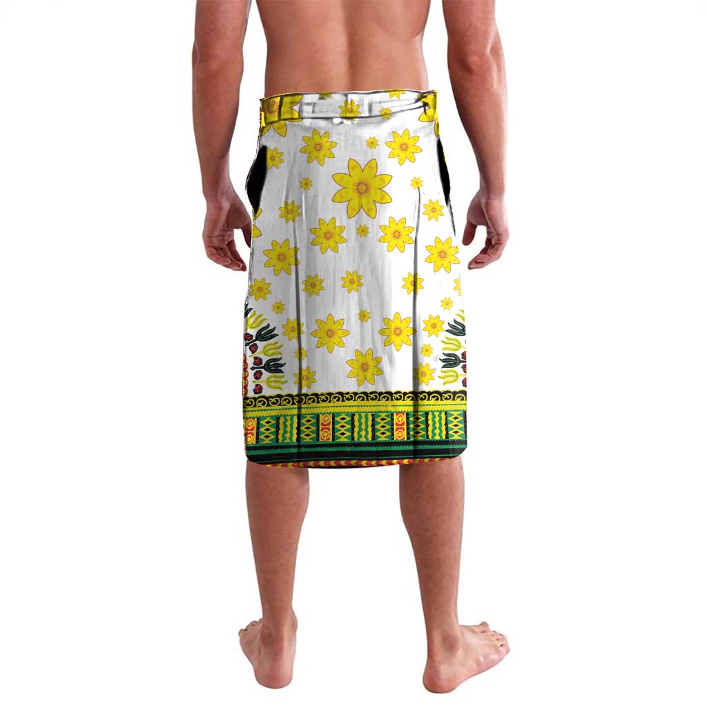 White dashiki-style knee skirt, yellow daisy print with multicolor banded hem