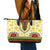 Enkutatash Dashiki and Adey Abeba Leather Tote Bag