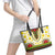 Enkutatash Dashiki and Adey Abeba Leather Tote Bag