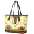 Enkutatash Dashiki and Adey Abeba Leather Tote Bag