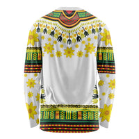 White long-sleeve dashiki shirt with V-neck yoke and floral/tribal patterns