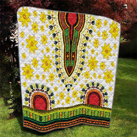 White quilt featuring yellow flower pattern, red arch medallions, and green yellow border
