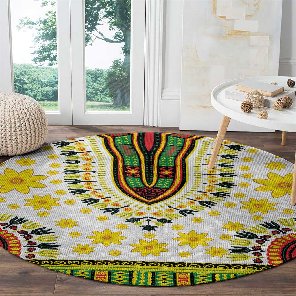 Round white rug with yellow flowers, green/red/black patterns, and scalloped border