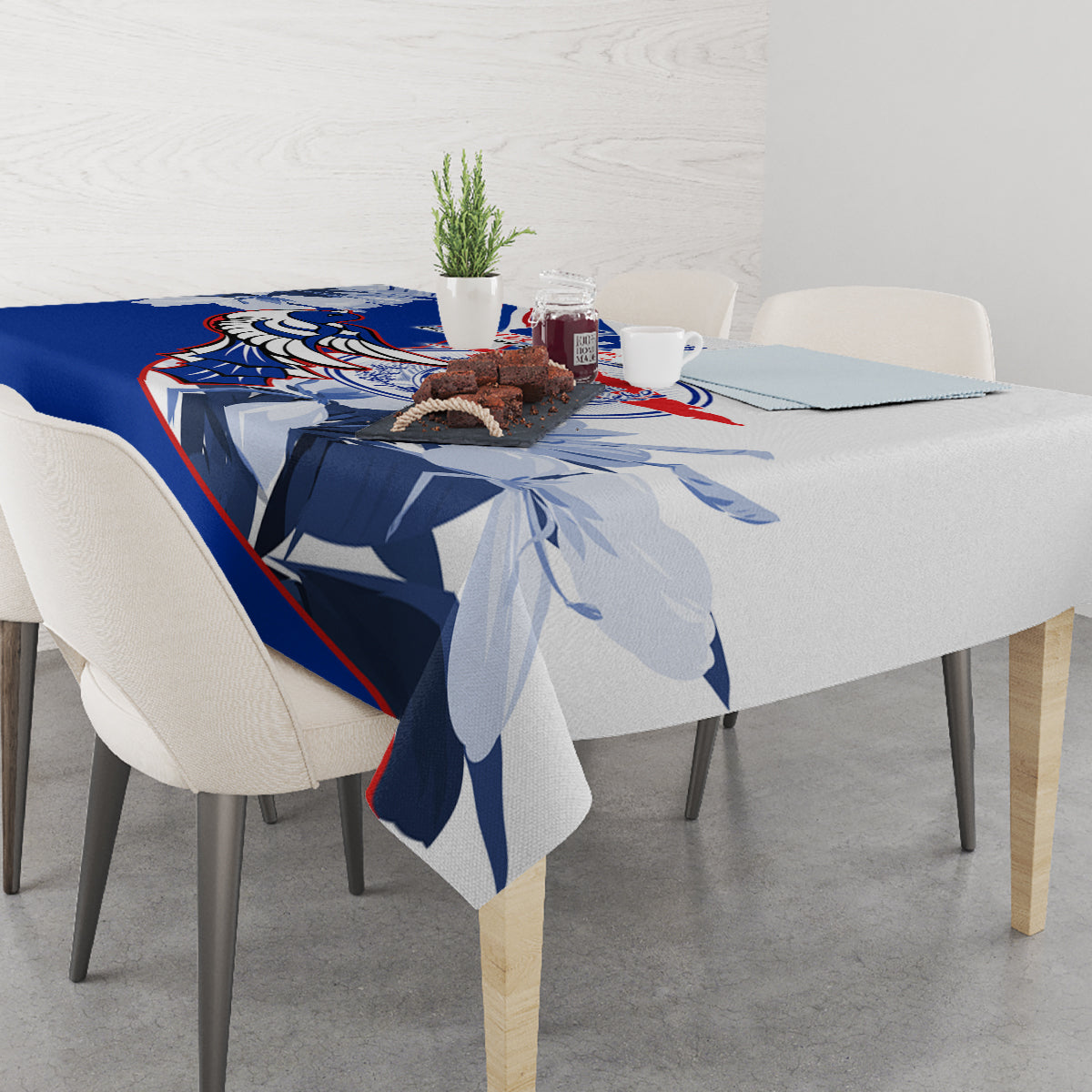 Blue patriotic tablecloth on dining table with matching print centerpiece