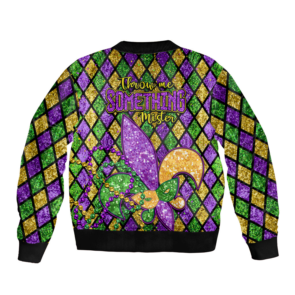 Black glitter bomber jacket with Mardi Gras back slogan and fleur-de-lis glitter art