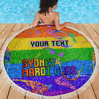 Round glitter beach blanket in rainbow Pride with 'YOUR TEXT' and 'SYDNEY MARDI GRAS', on deck