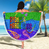 Round glitter beach blanket in rainbow Pride with 'YOUR TEXT' and 'SYDNEY MARDI GRAS', held up