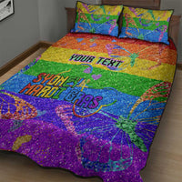Rainbow glitter quilt and two pillow covers with large Pride text and rainbow diagonal bands