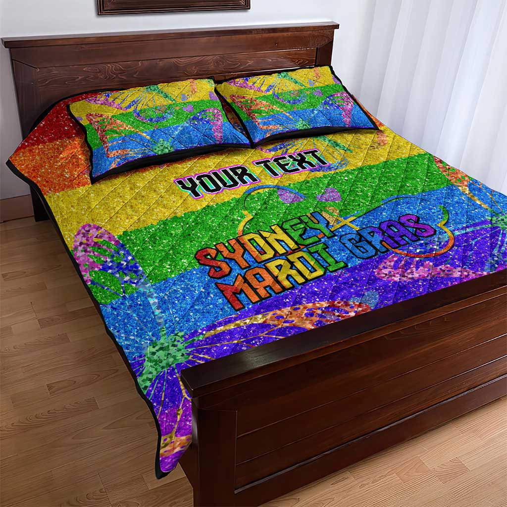Rainbow glitter quilt and pillow set with bold personalized Pride text and confetti pattern