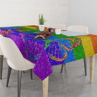 Rainbow glitter pride tablecloth with colorful butterfly-style pattern, draped over dining table