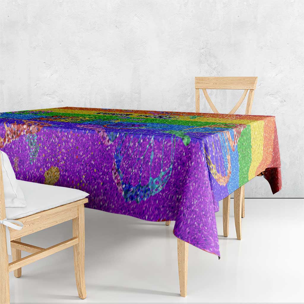 Rainbow glitter pride tablecloth with vivid rainbow design, draped on banquet table