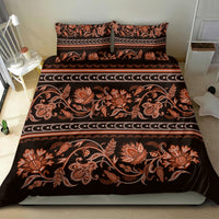 Dark brown duvet set with orange floral ornament and two matching pillowcases