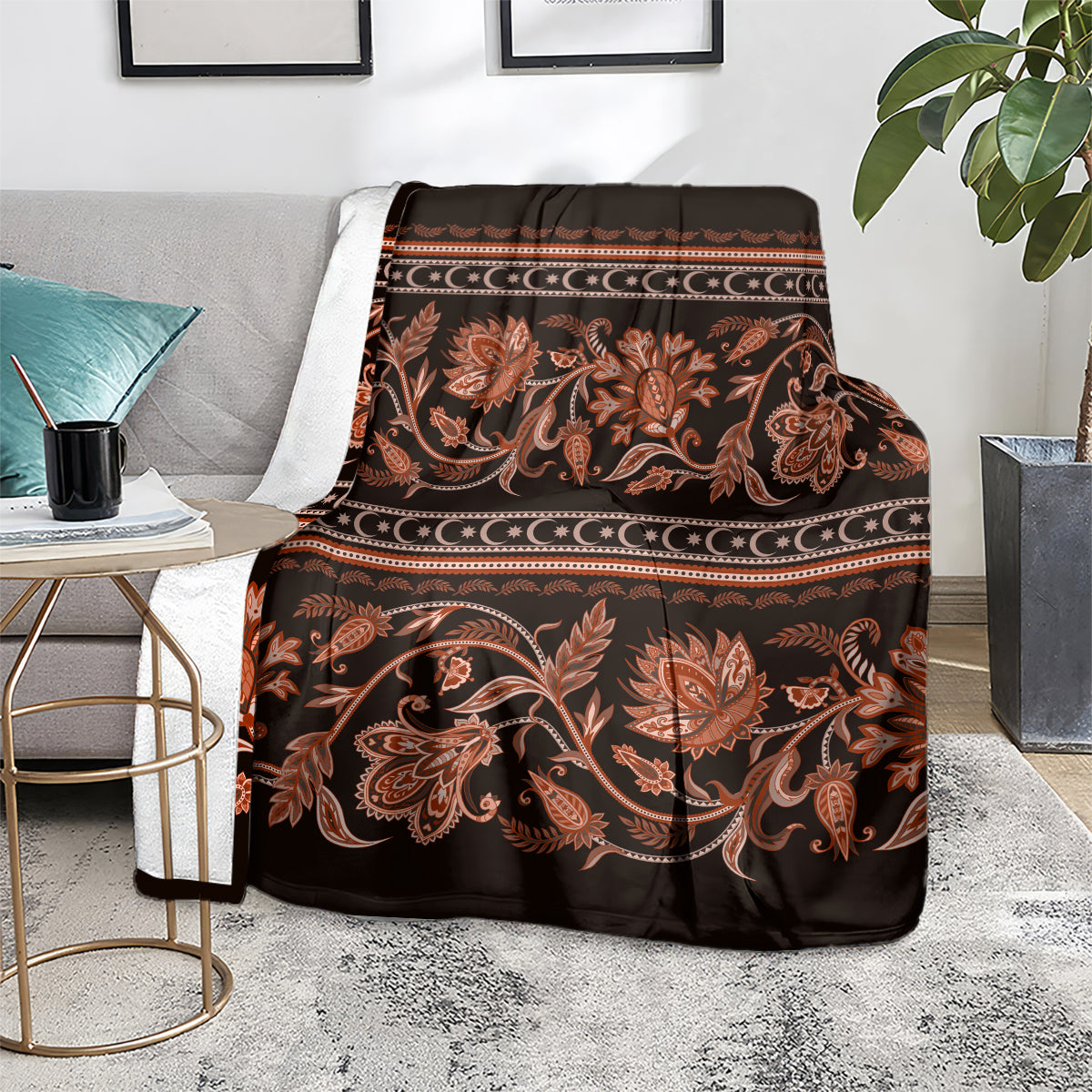 Traditional patterned throw blanket over chair, floral buta ornaments with horizontal borders