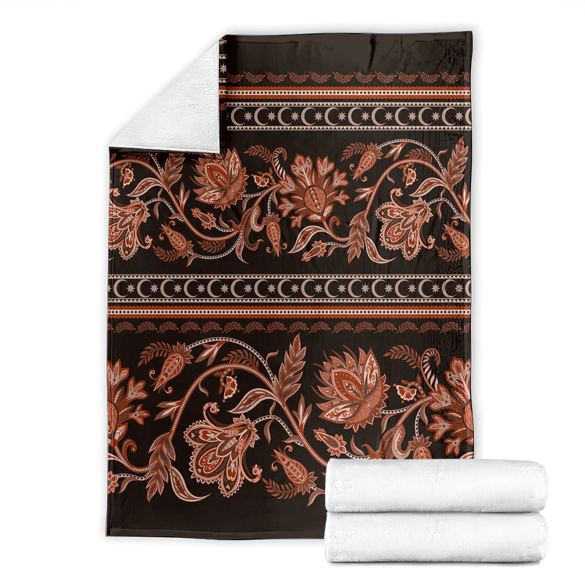 Traditional patterned throw blanket folded with matching white towels, floral buta ornaments