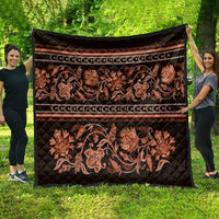 Black traditional quilt with orange floral buta pattern and horizontal decorative bands
