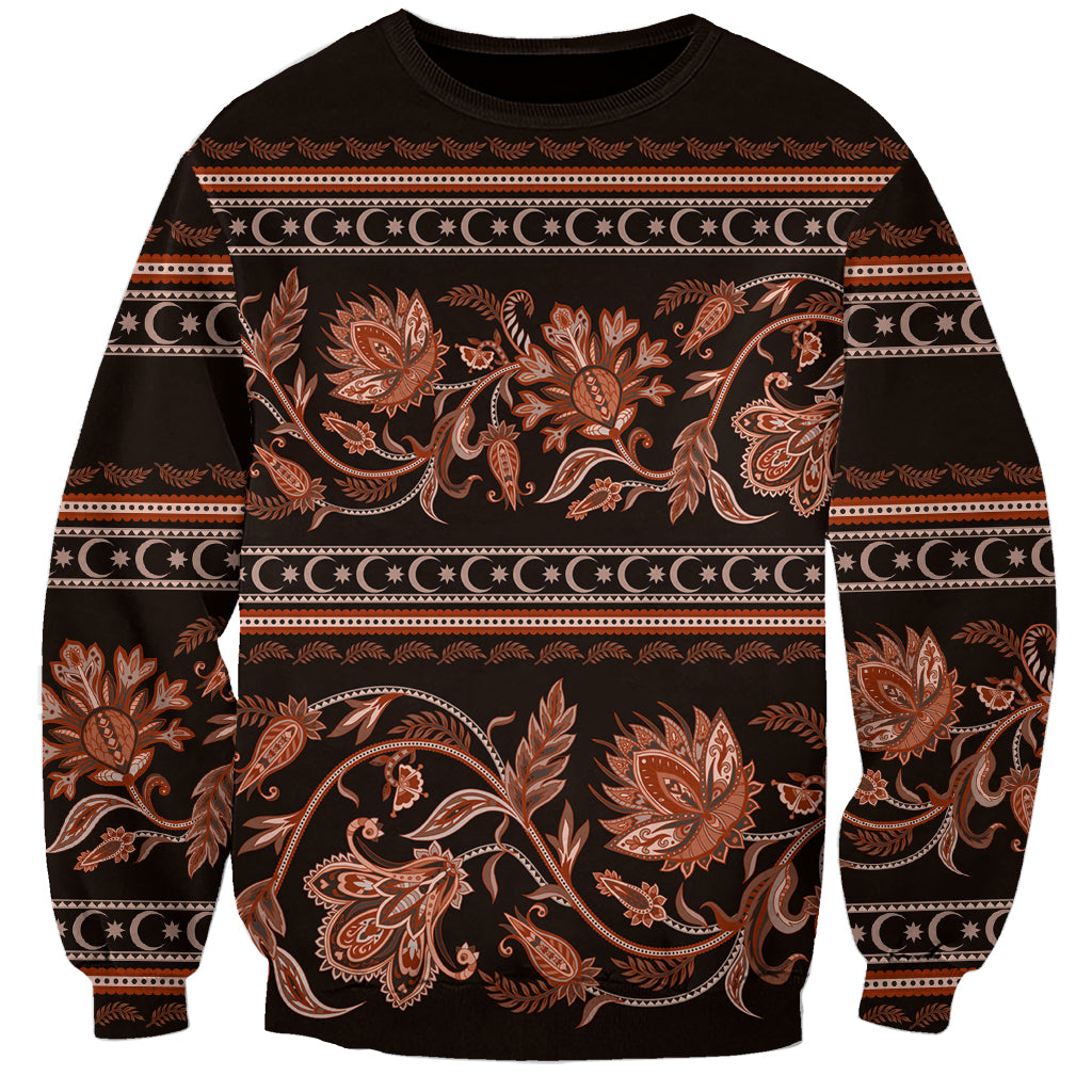 Unisex sweatshirt in dark brown with gold floral buta ornament and striped bands